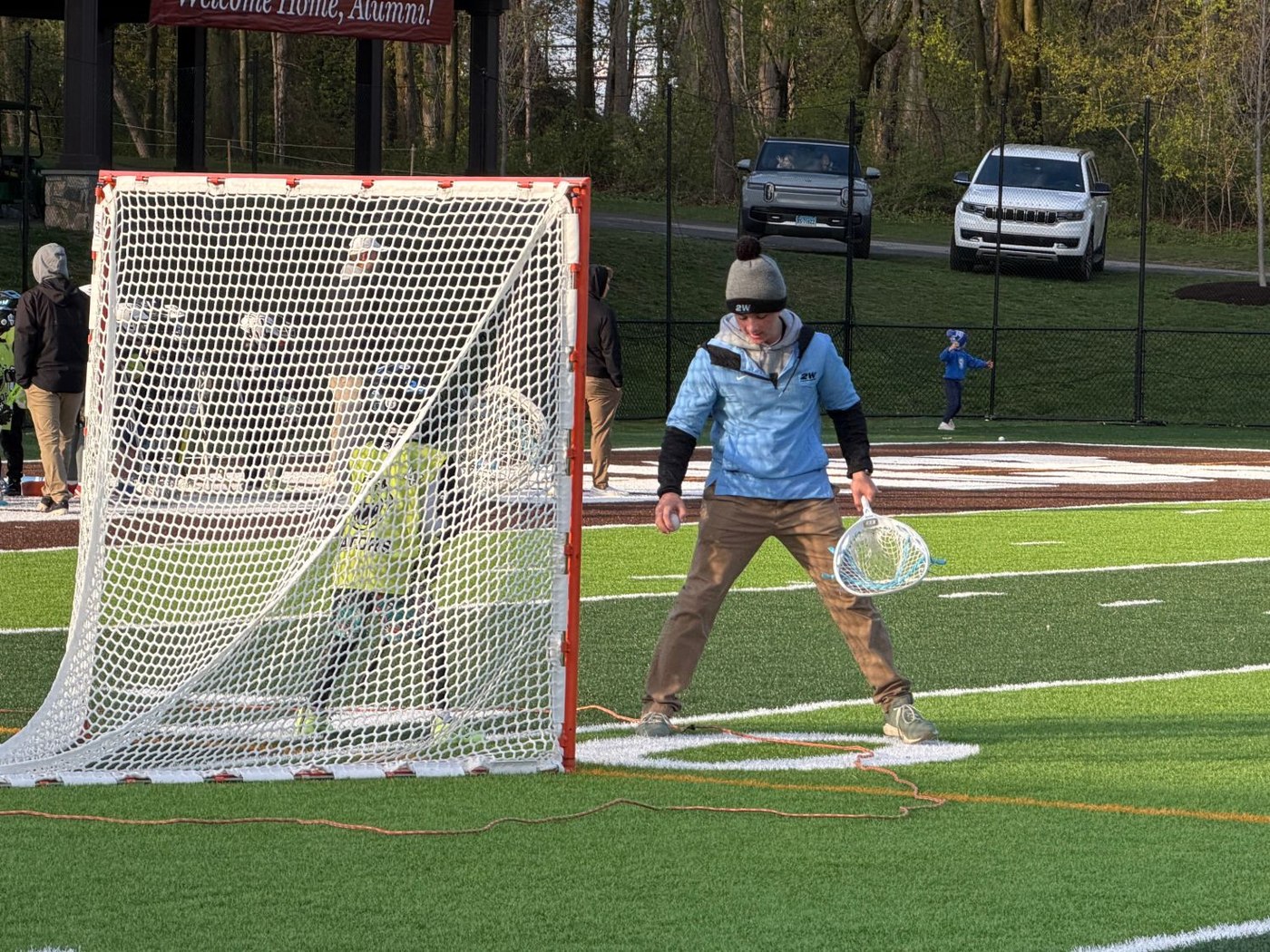 Jack Crombie running a youth lacrosse session at the goal