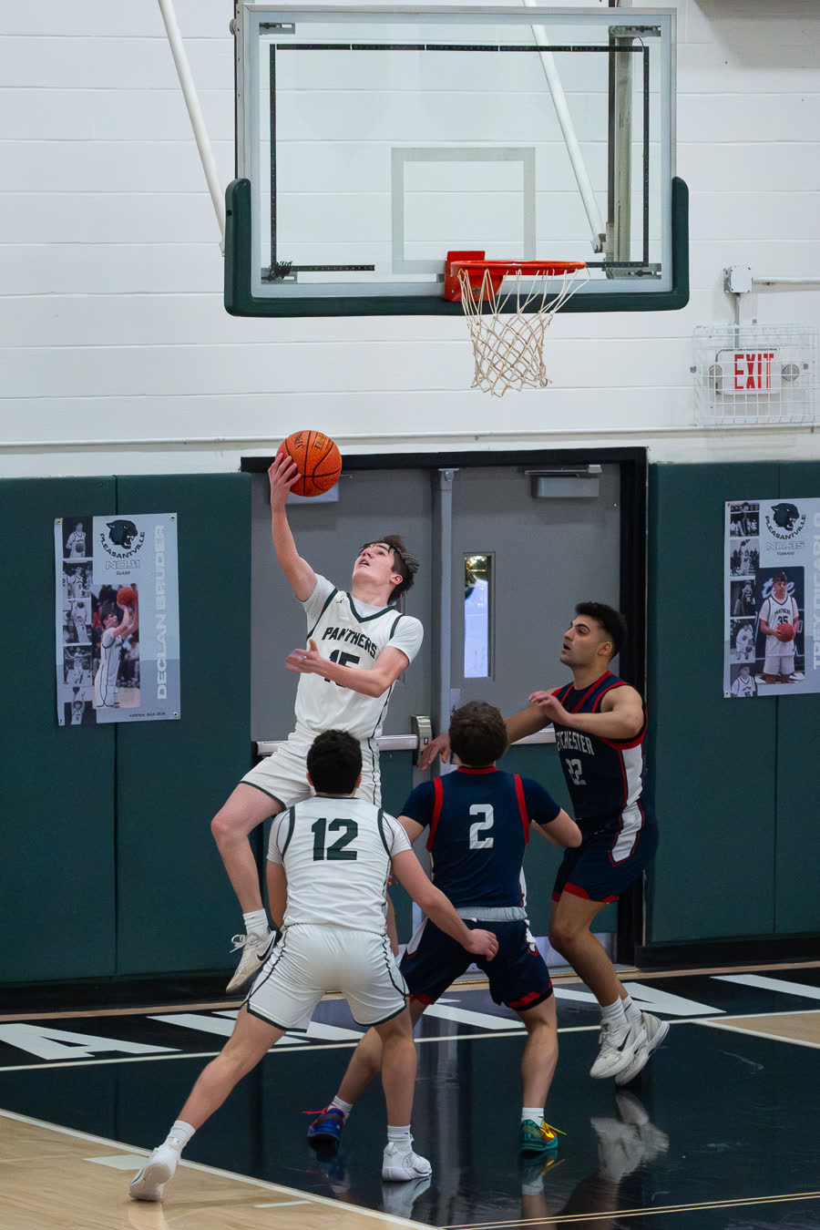 A contested layup under the basket