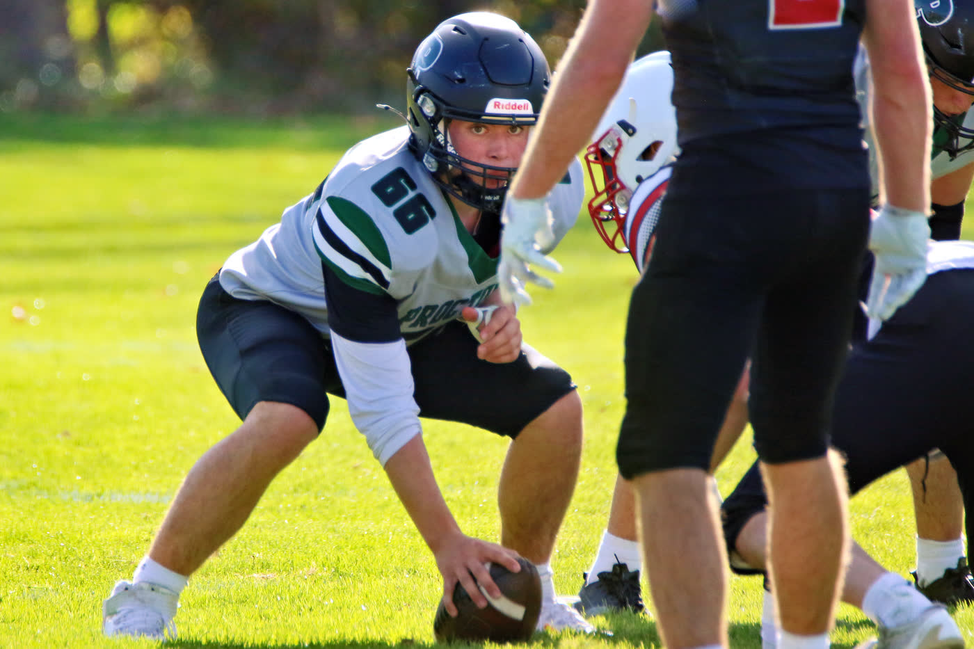 Jack Crombie, 66, over the ball at center for Proctor