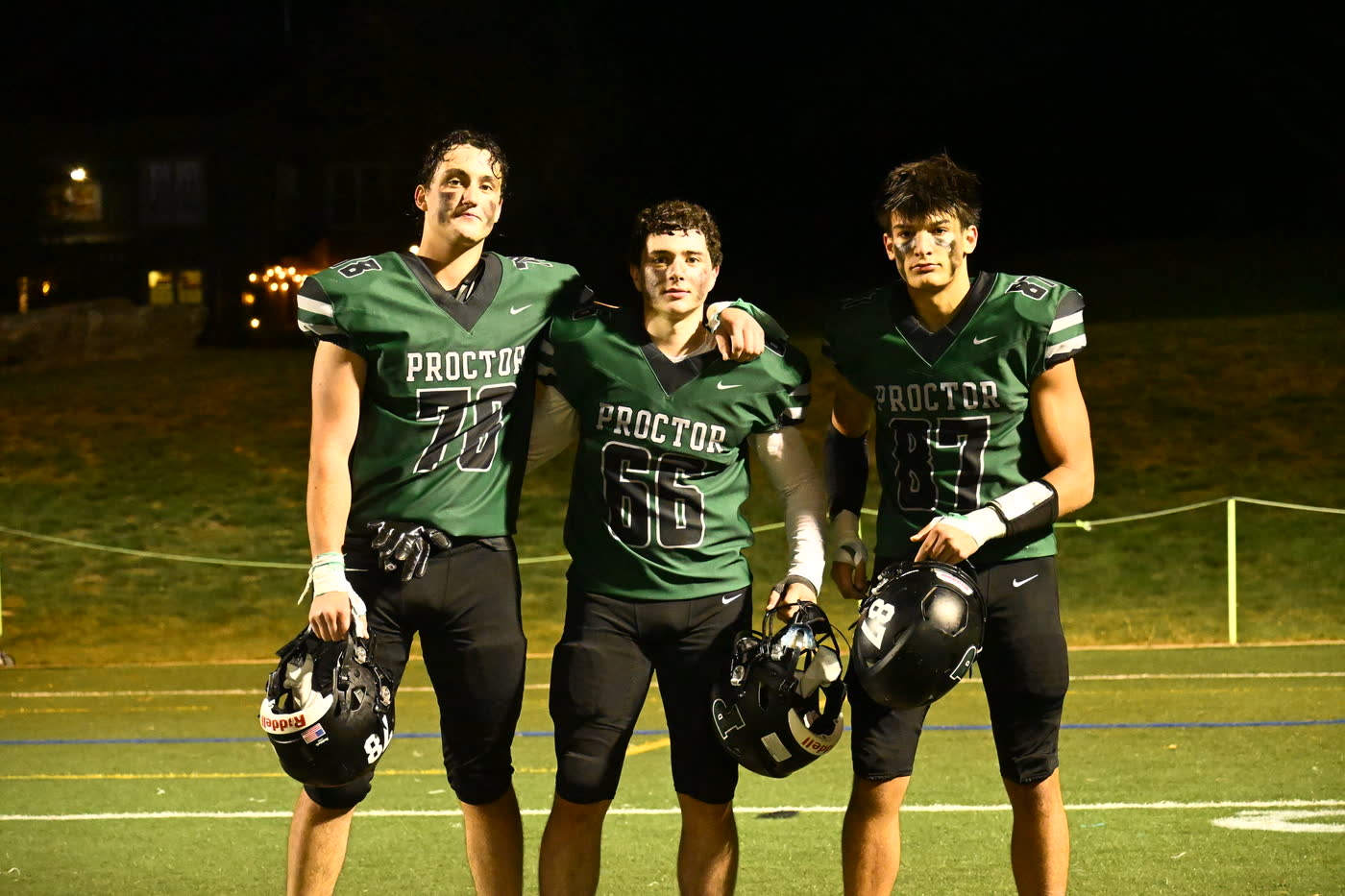 Jack Crombie, 66, with two Proctor teammates after a night game